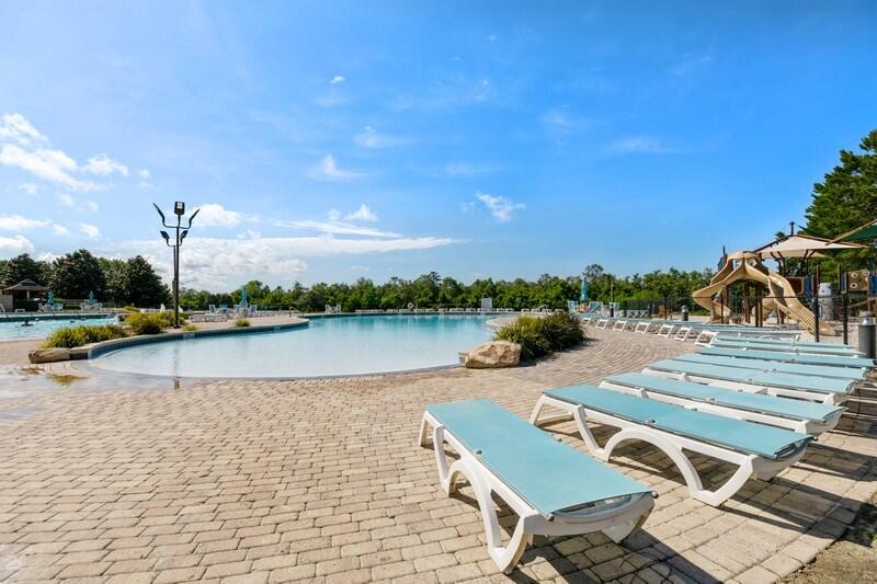 221 Sweet Tea Lane Freeport, FL 32439 - Photo 38 of 55 a view of a lake with couches and sky view