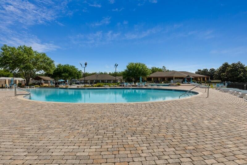 221 Sweet Tea Lane Freeport, FL 32439 - Photo 40 of 55 a view of a lake with a yard