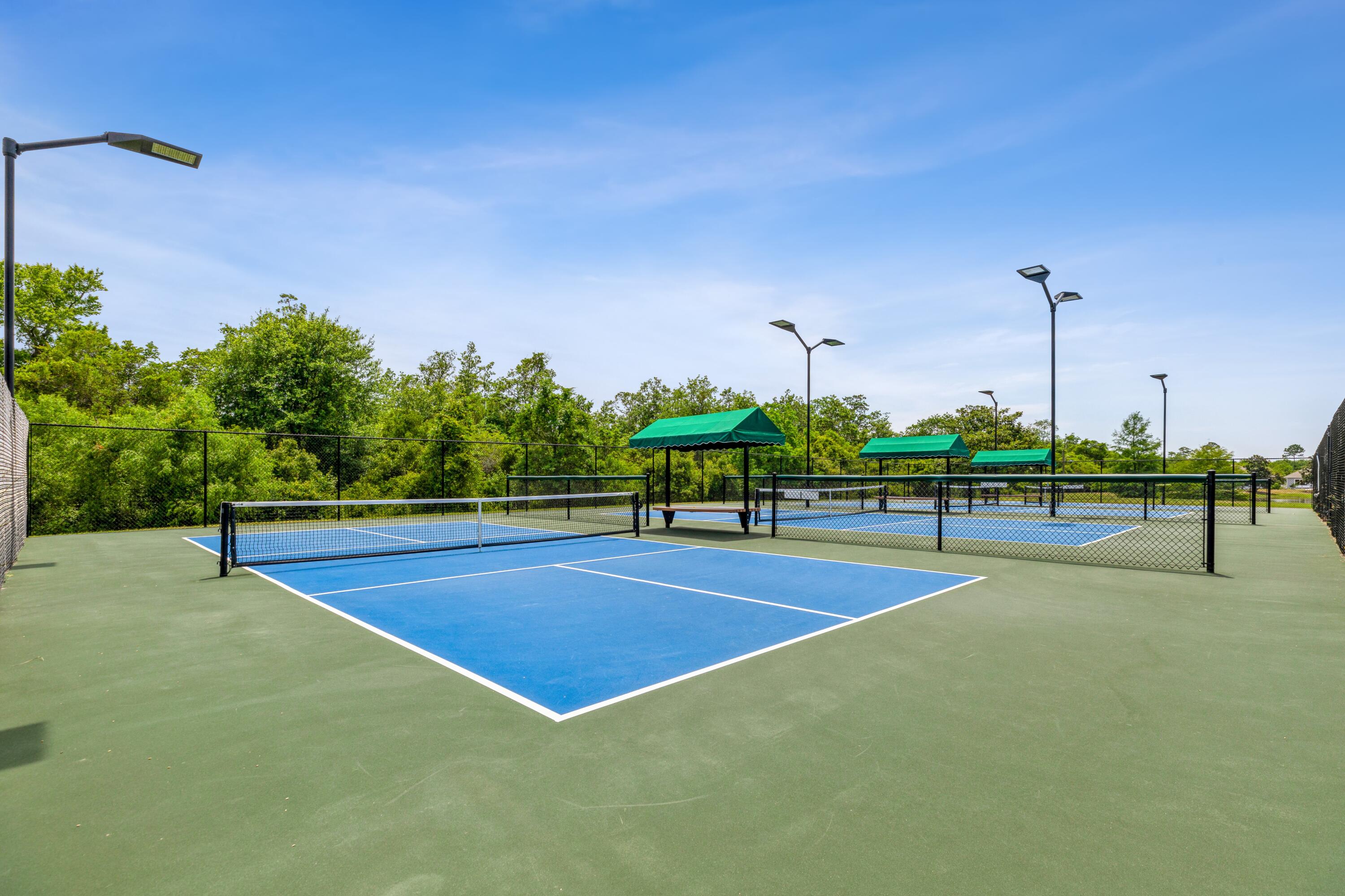 221 Sweet Tea Lane Freeport, FL 32439 - Photo 44 of 55 a view of a tennis court