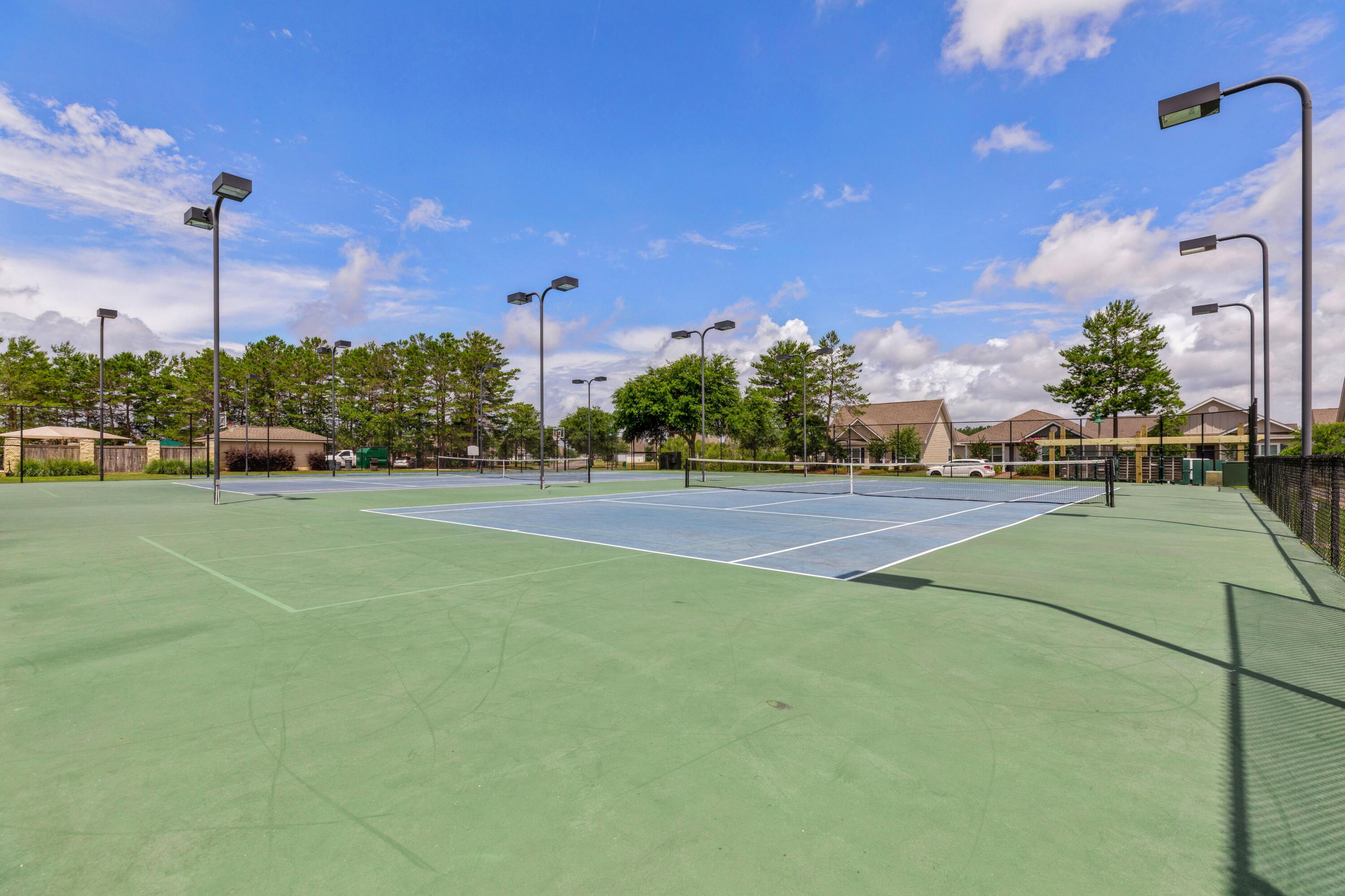 221 Sweet Tea Lane Freeport, FL 32439 - Photo 45 of 55 a view of a tennis court