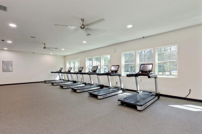 221 Sweet Tea Lane Freeport, FL 32439 - Photo 48 of 55 a room with gym equipment and a large window