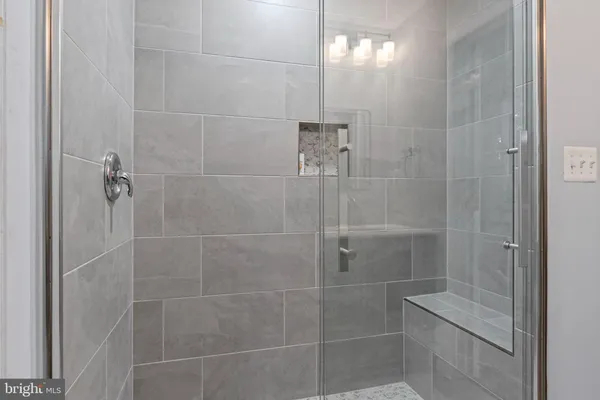 a view of a bathroom from the hallway