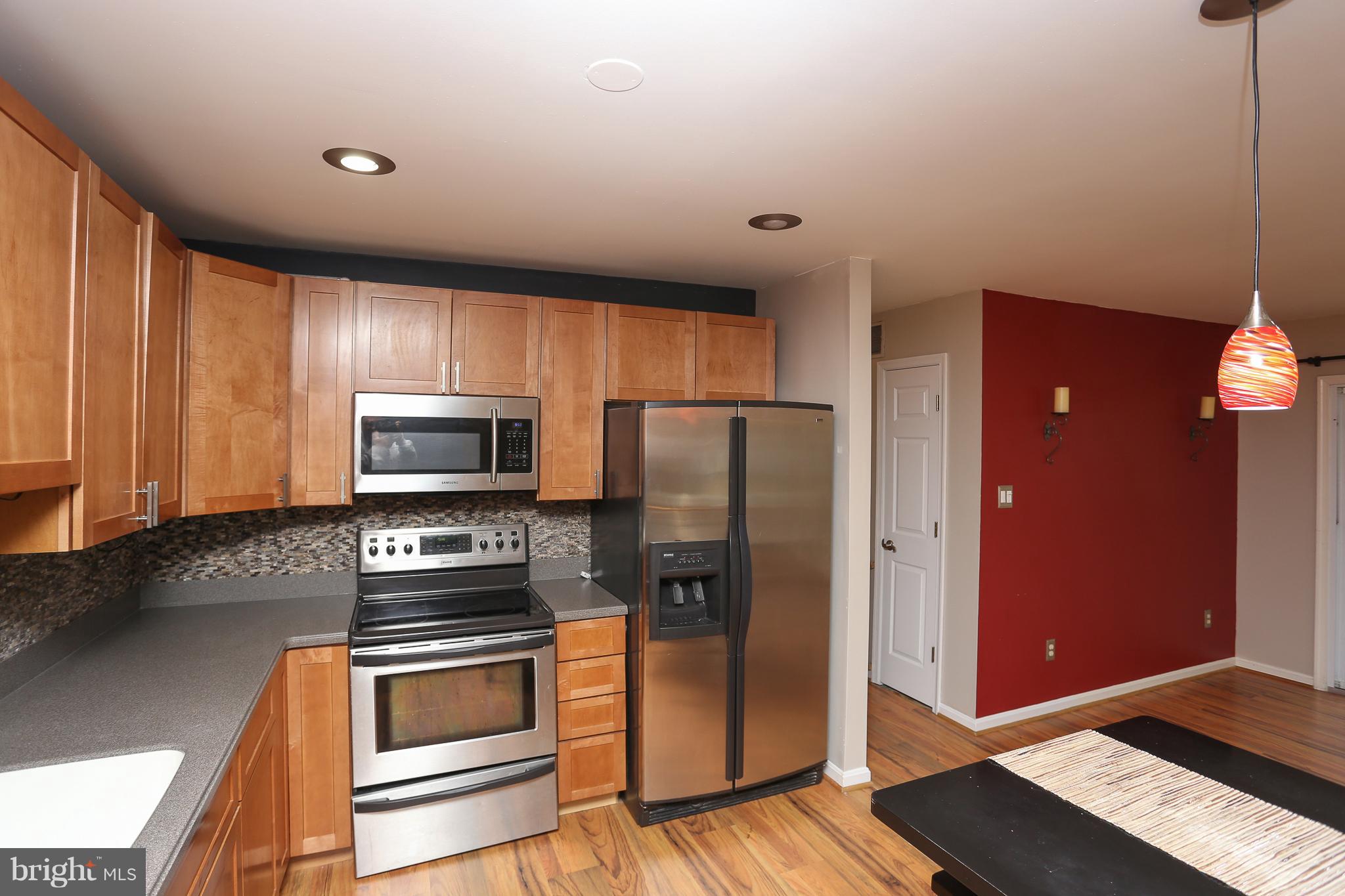 262 Ullman Road Pasadena, MD 21122 - Photo 5 of 24 Corian Counter Tops & SS appliances!