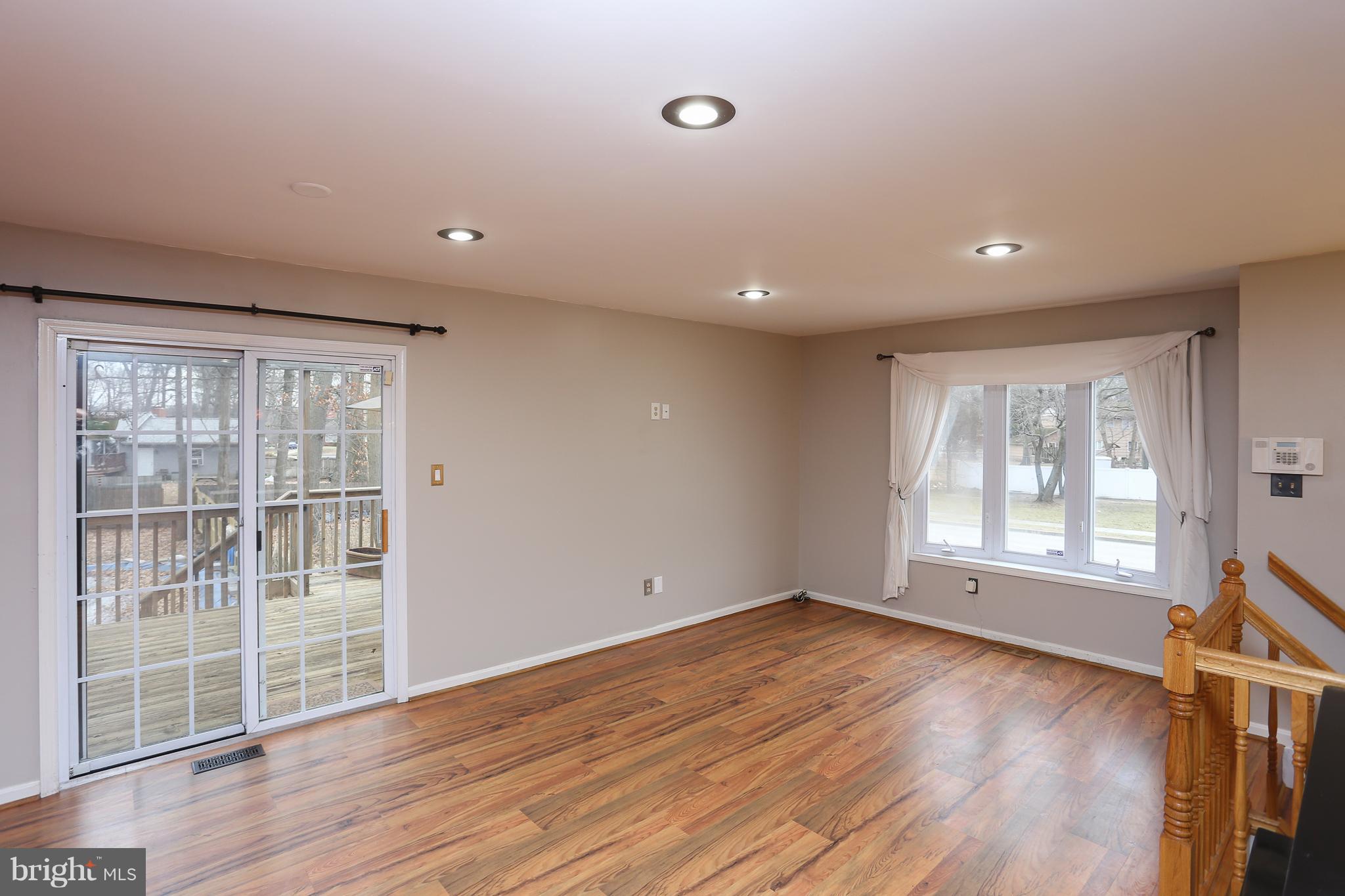 262 Ullman Road Pasadena, MD 21122 - Photo 7 of 24 Living Room Leading To The Back Yard