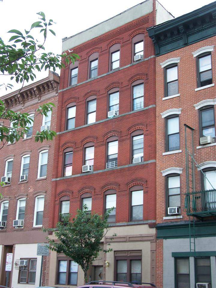 599 Grove Street, Unit 4 Jersey City, NJ 07310 - Photo 4 of 4 a front view of a building