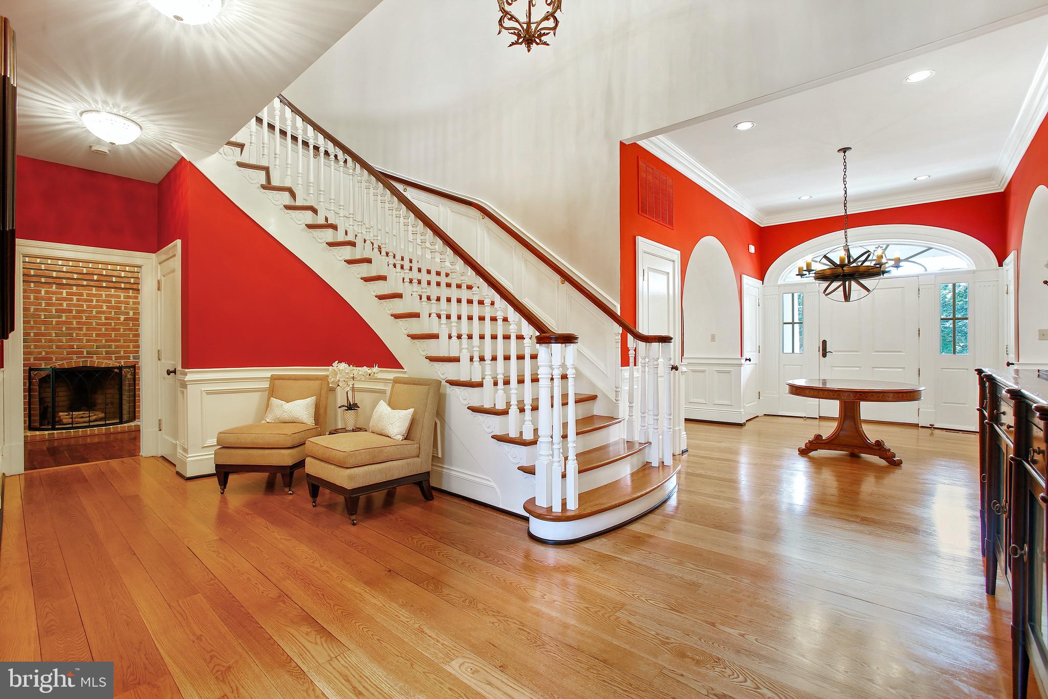838 Childs Point Road Annapolis, MD 21401 - Photo 22 of 85 Formal staircase with mahogany railing