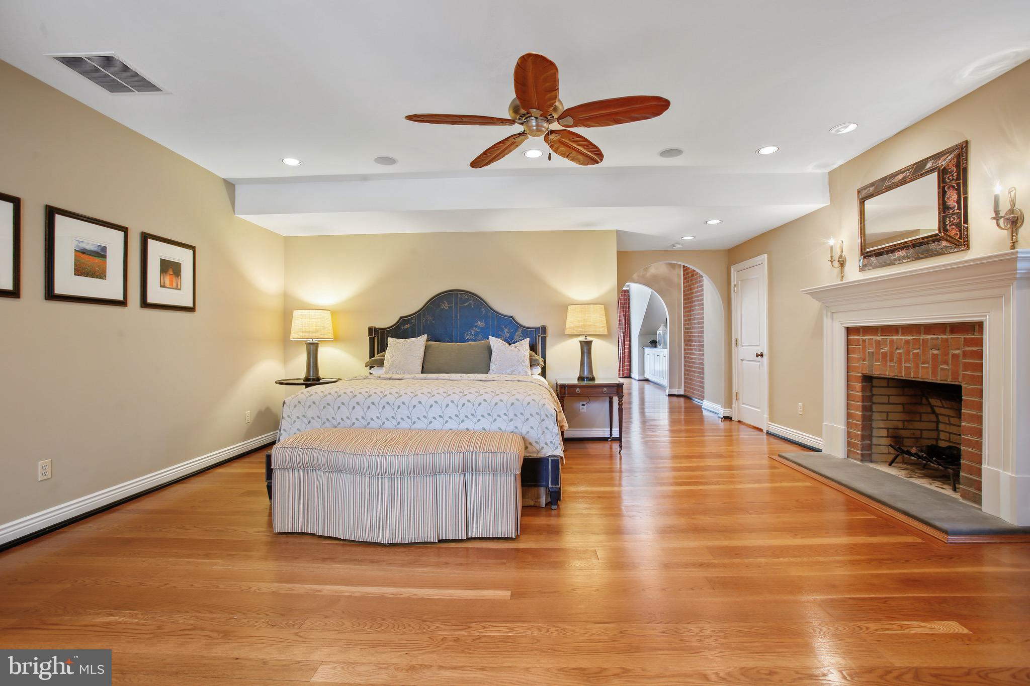 838 Childs Point Road Annapolis, MD 21401 - Photo 35 of 85 Master suite w/ fireplace, walk-in closets