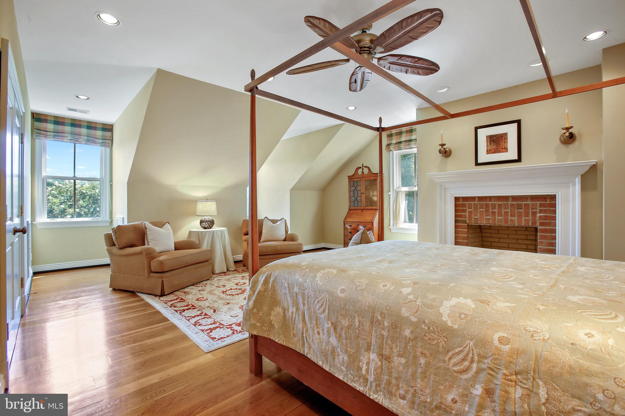838 Childs Point Road Annapolis, MD 21401 - Photo 42 of 85 2nd level guest bedroom.1 w/ brick fireplace