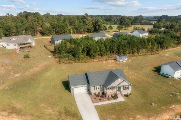 a view of a swimming pool with a lake view
