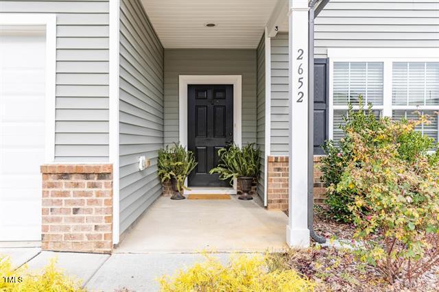 2652 Averon Drive Fuquay-Varina, NC 27526 - Photo 2 of 11 a view of a entryway door front of house