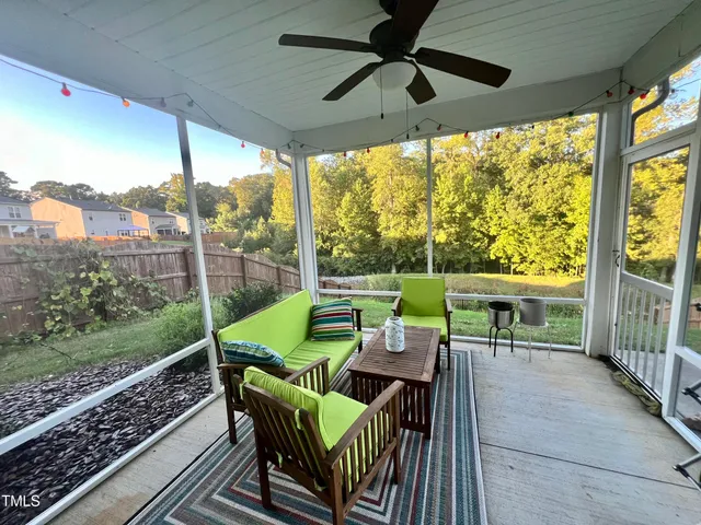 a view of porch with a seating space