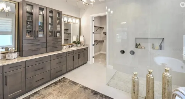 a bathroom with a bathtub and shower