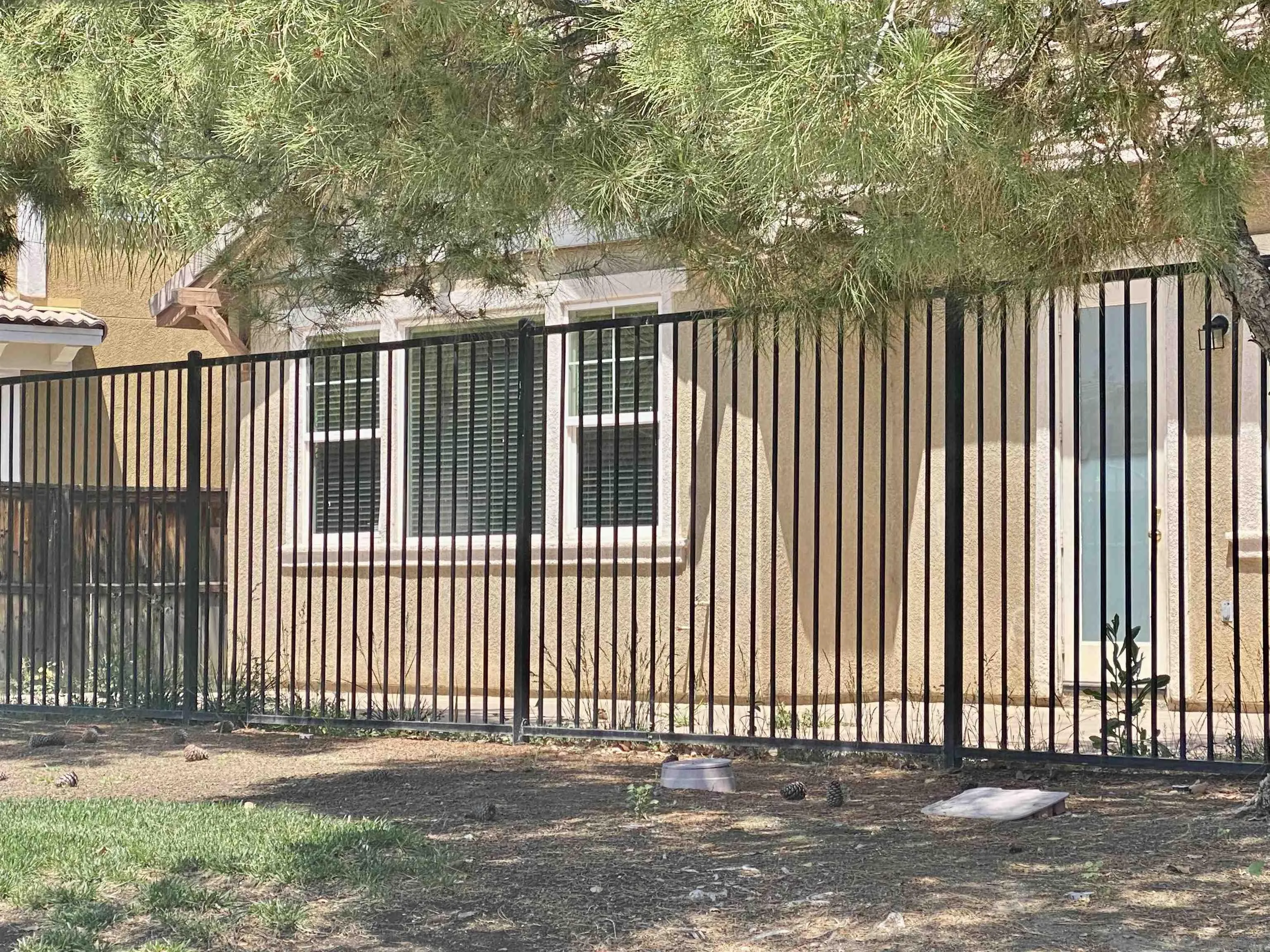 1301 Bee Balm Road Hemet, CA 92545 - Photo 10 of 17 a view of a black gate
