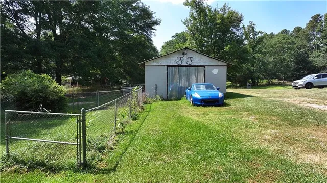 a view of a garden with a lake