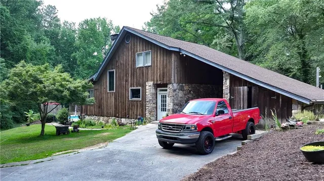 a view of swimming pool with a yard