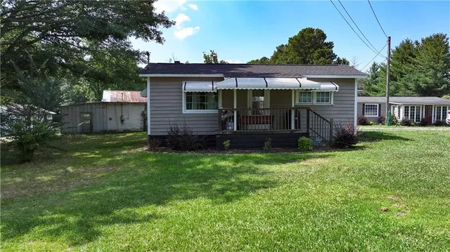 a view of a backyard with a garden