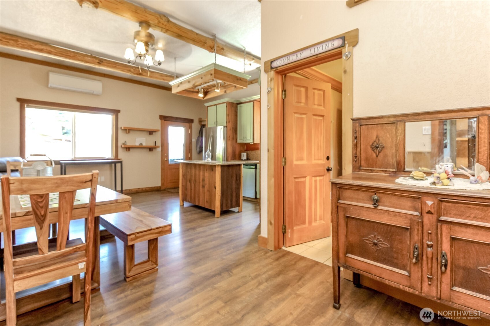 3116 Harts Lake Road South Roy, WA 98580 - Photo 11 of 39 a open kitchen with a refrigerator a sink and cabinets