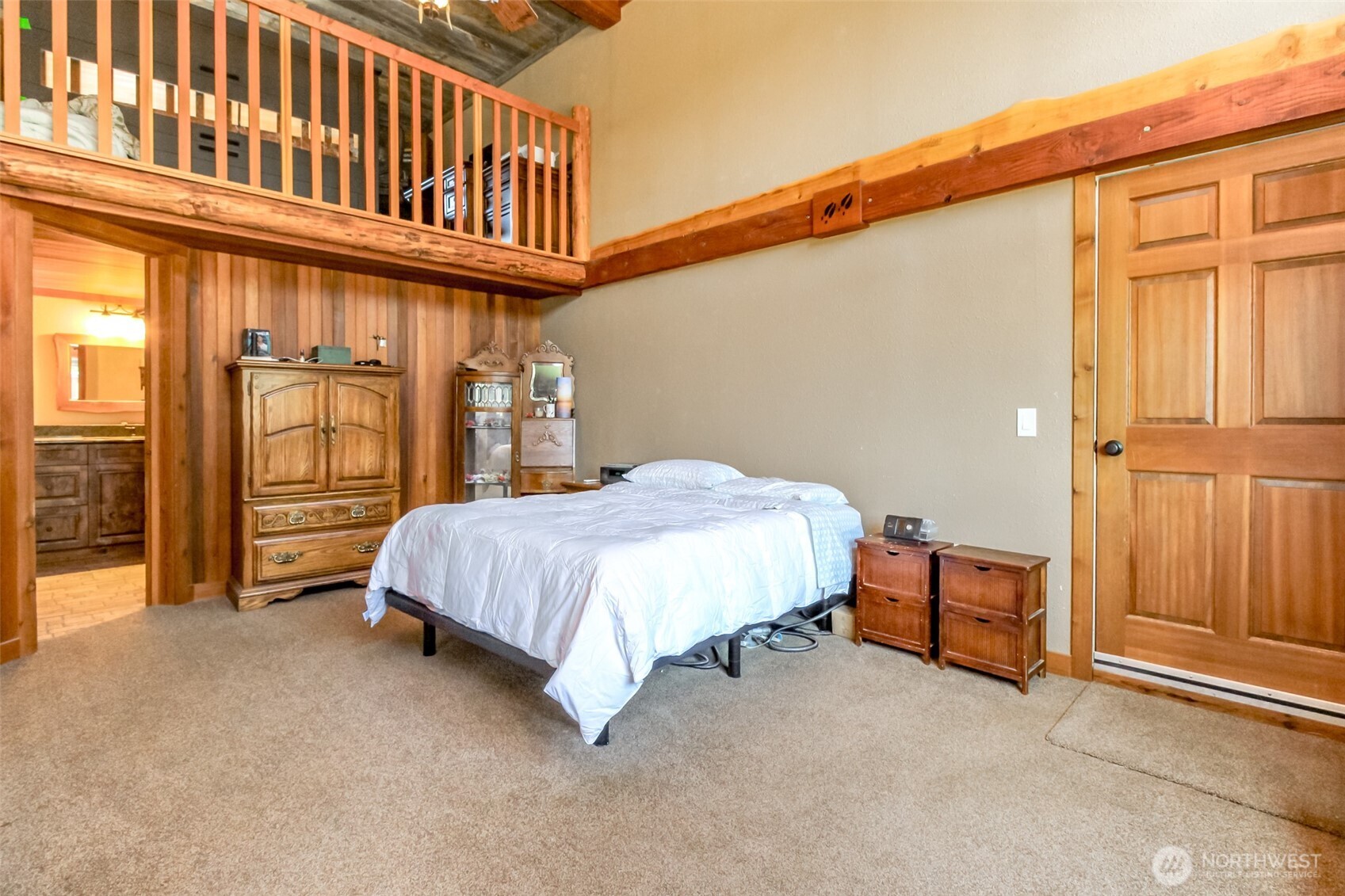 3116 Harts Lake Road South Roy, WA 98580 - Photo 17 of 39 a spacious bedroom with a bed and a window