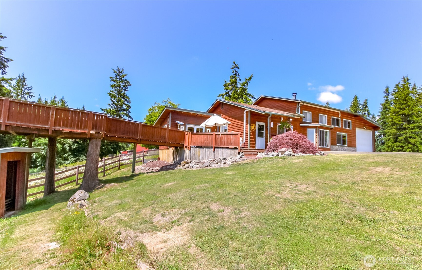 3116 Harts Lake Road South Roy, WA 98580 - Photo 31 of 39 a view of a house with a yard porch and sitting area
