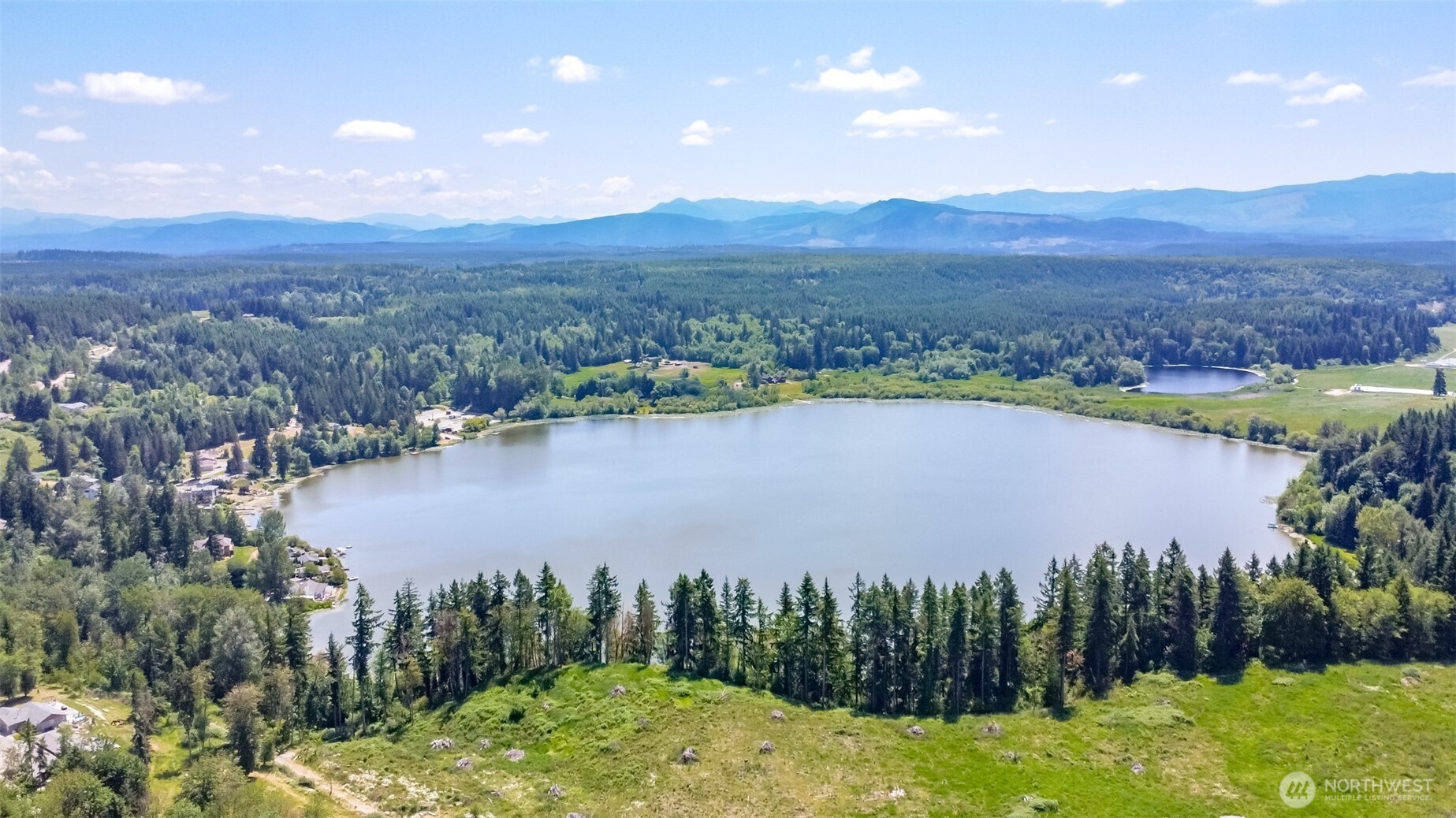 3116 Harts Lake Road South Roy, WA 98580 - Photo 38 of 39 a view of a lake from a city