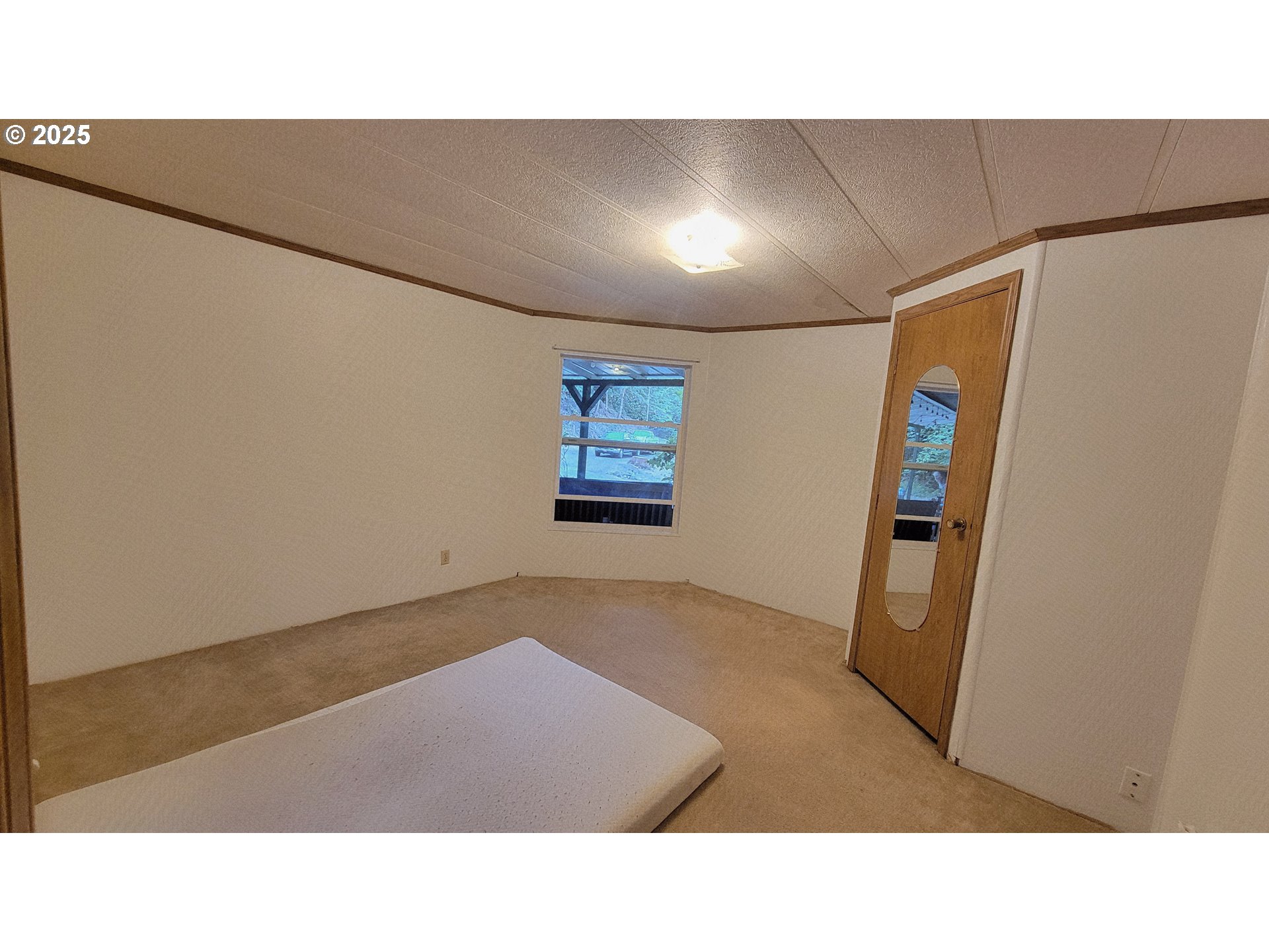 1097 Lees Creek Road Myrtle Creek, OR 97457 - Photo 23 of 41 a open kitchen with furniture and a refrigerator