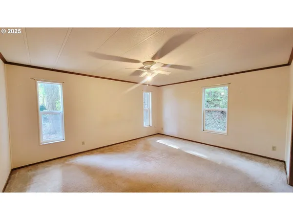 a open hall with a ceiling fan