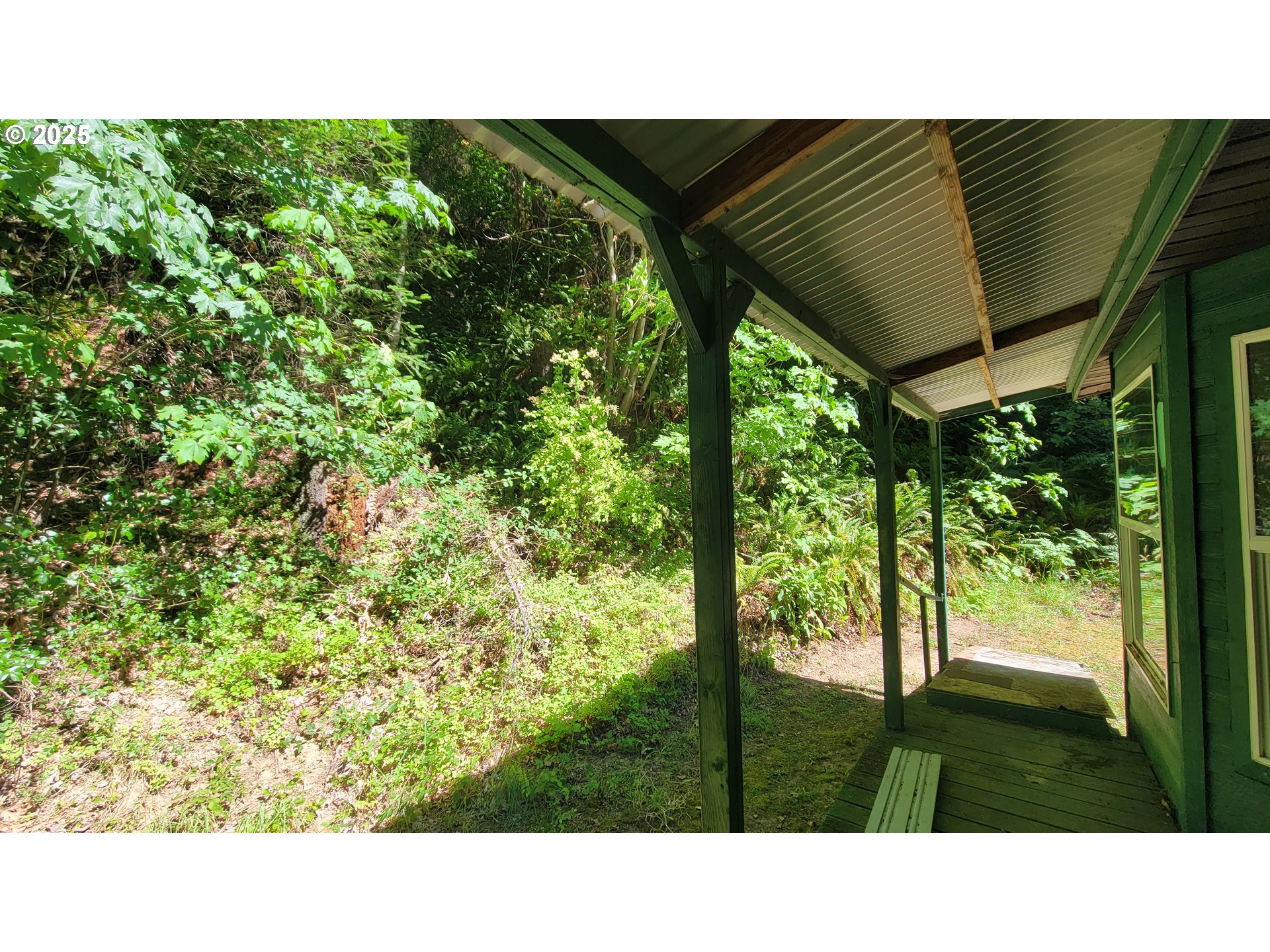 1097 Lees Creek Road Myrtle Creek, OR 97457 - Photo 36 of 41 a black and white photo of a green field