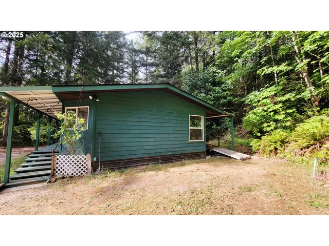 a backyard of a house with lots of green space