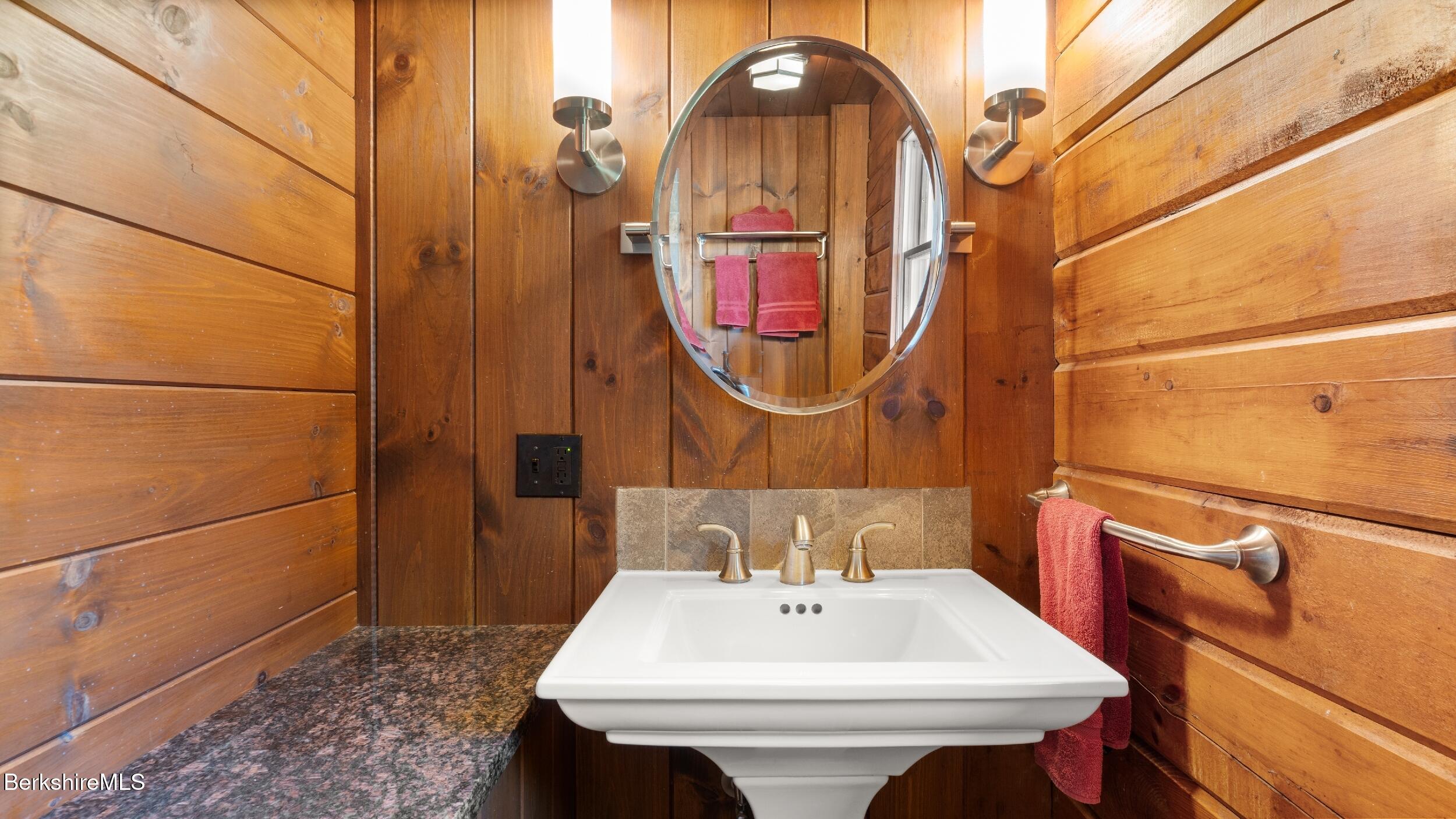 134 Hurlburt Road Great Barrington, MA 01230 - Photo 20 of 50 a bathroom with a sink and a mirror