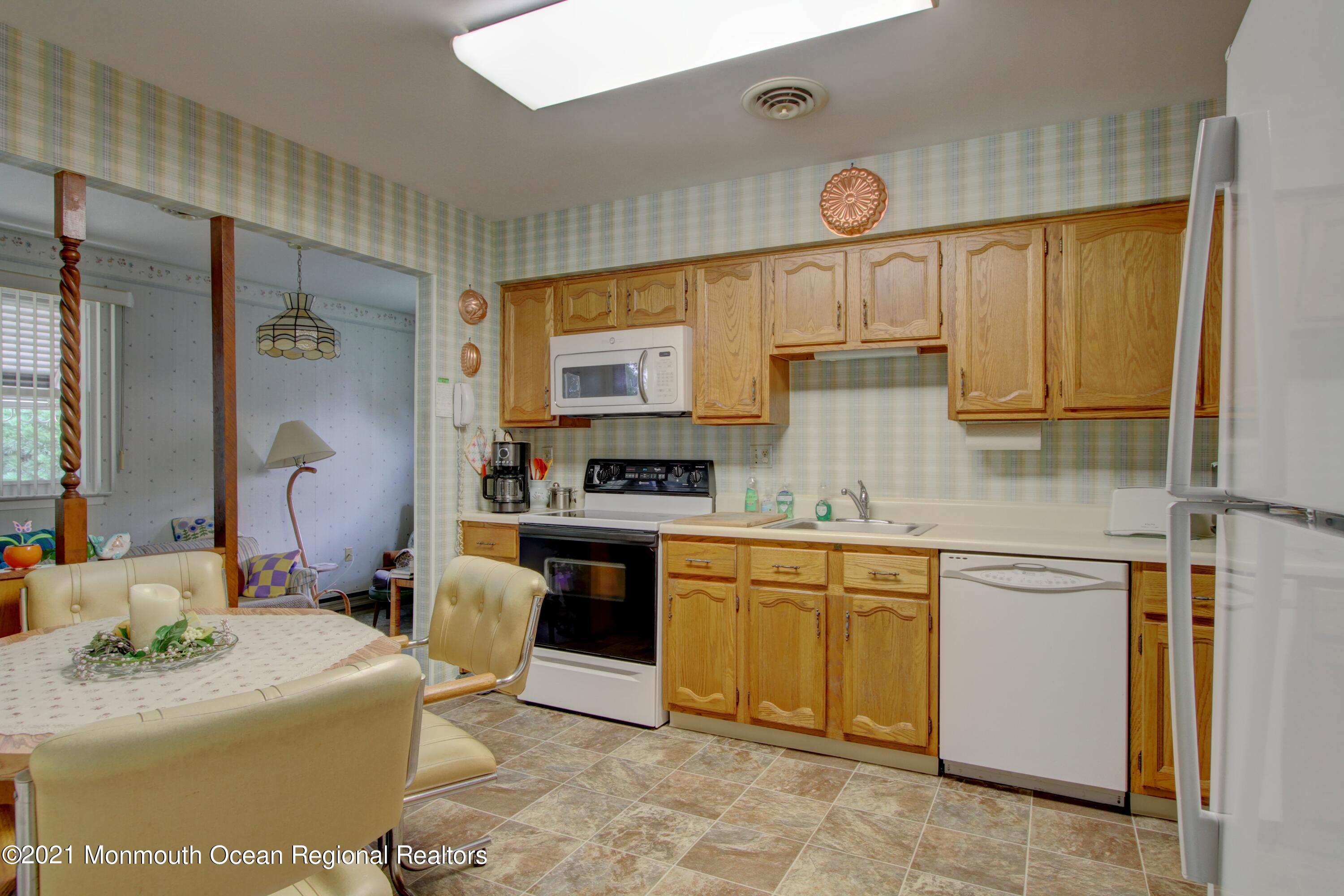 5 Amherst Road Whiting, NJ 08759 - Photo 3 of 29 a kitchen with cabinets a sink and appliances