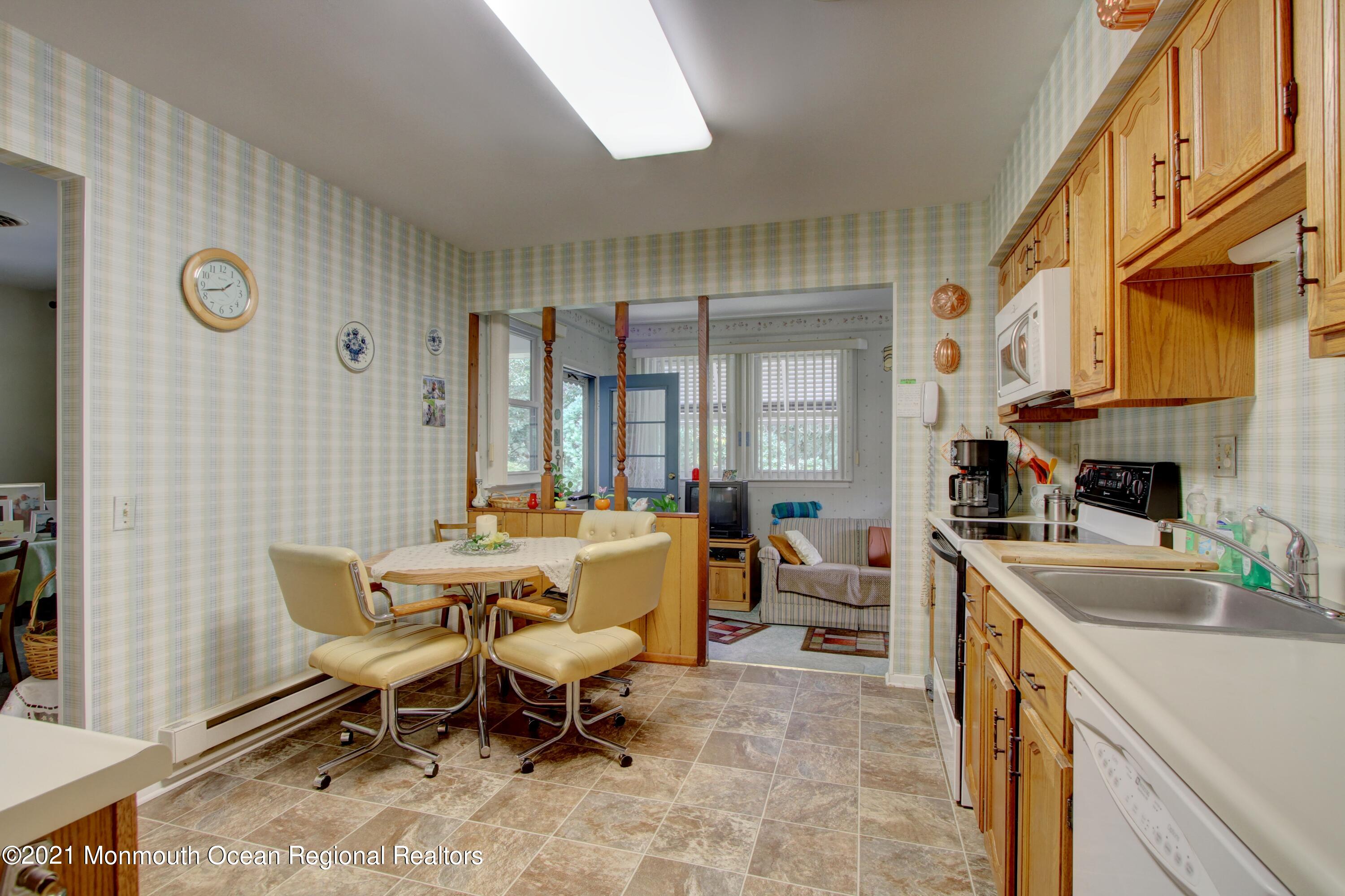 5 Amherst Road Whiting, NJ 08759 - Photo 4 of 29 a view of a dining room with furniture window and outside view