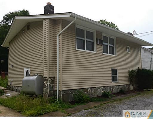 57 Driftway Road Howell, NJ 07731 - Photo 13 of 13 a front view of a house with plants
