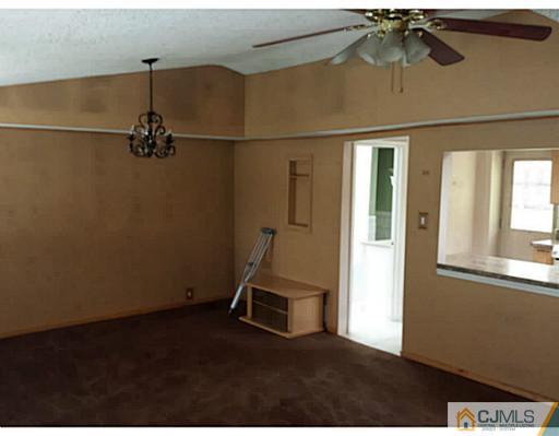57 Driftway Road Howell, NJ 07731 - Photo 4 of 13 an empty room with windows