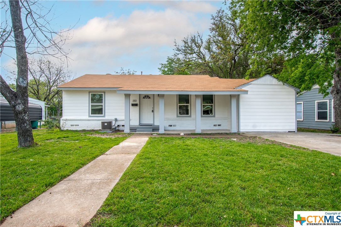 150 Circle Drive Belton, TX 76513 - Photo 1 of 1 a front view of house with yard and green space
