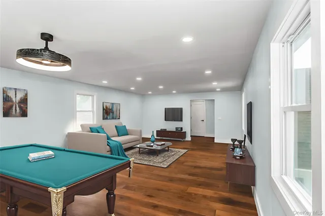 a living room with furniture and a table