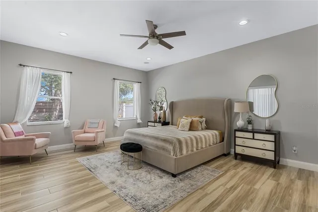 a bedroom with bed and window