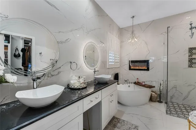 a bathroom with a double vanity sink and a mirror