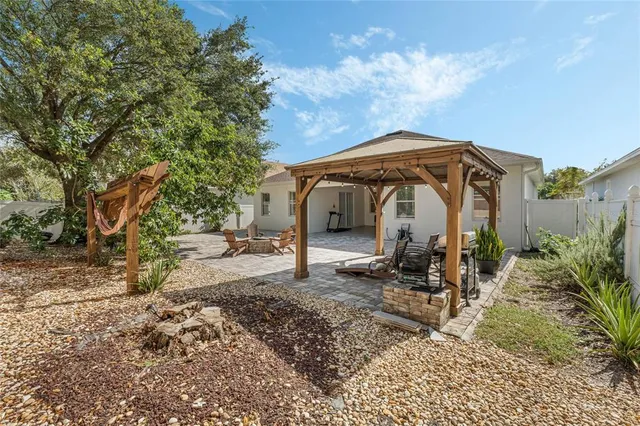a view of a car parked in front of a house
