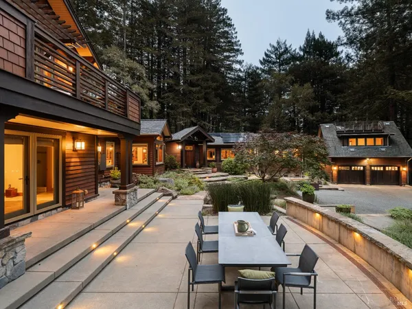 a view of a yard with swimming pool