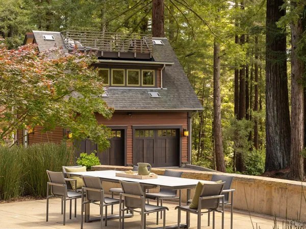 a view of a backyard with garden