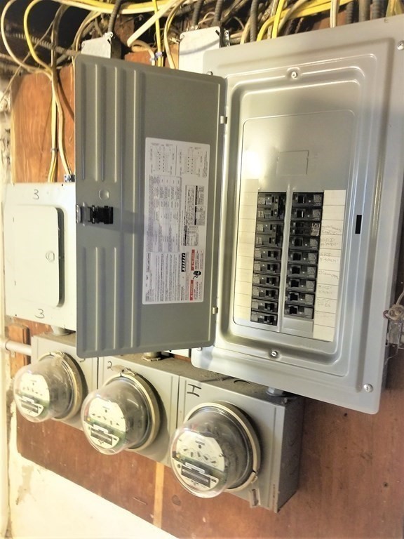 12 Linden Circle Somerville, MA 02143 - Photo 20 of 24 a bedroom with a bed and a window