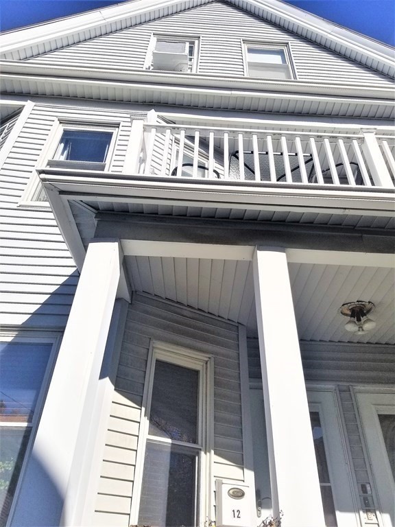 12 Linden Circle Somerville, MA 02143 - Photo 3 of 24 a close view of a fireplace
