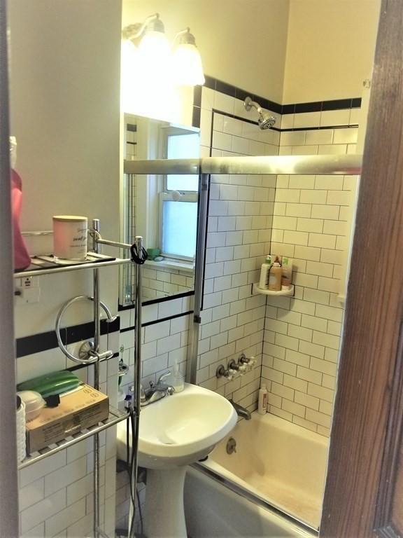 12 Linden Circle Somerville, MA 02143 - Photo 8 of 24 a bathroom with a toilet sink and shower