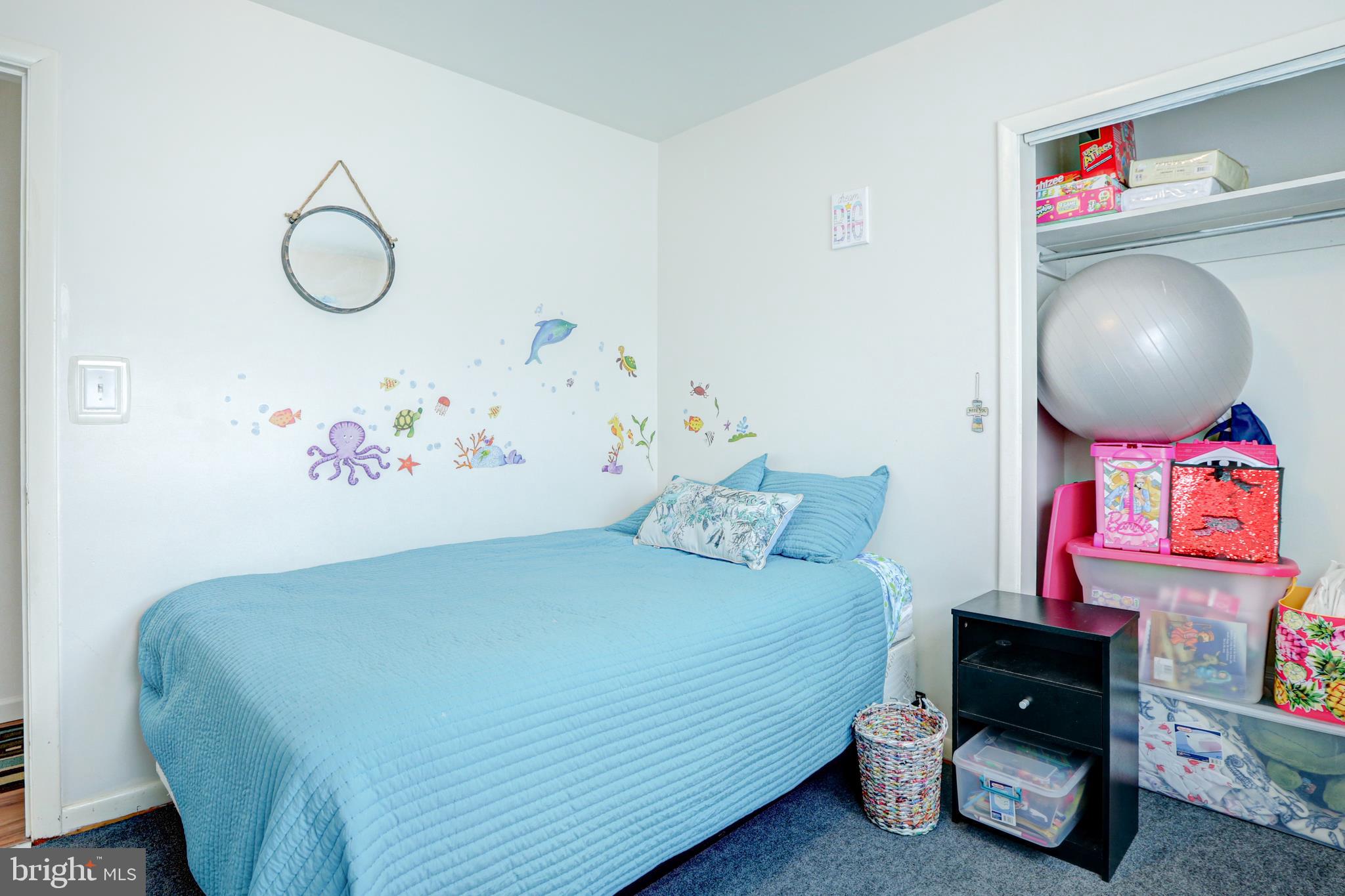 12 Jefferson Road Pennsville, NJ 08070 - Photo 19 of 63 a bedroom with a bed and a painting on the wall