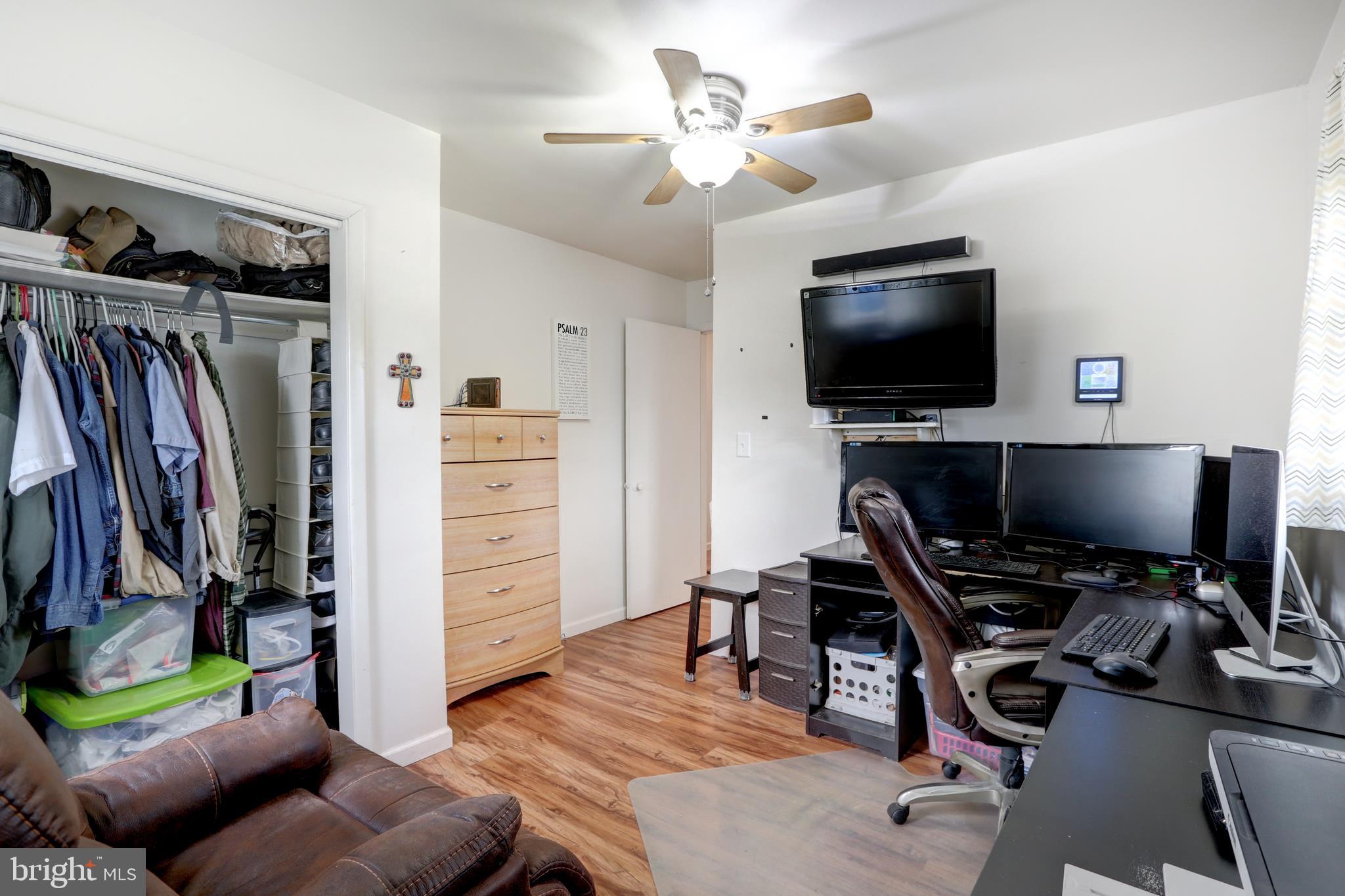 12 Jefferson Road Pennsville, NJ 08070 - Photo 24 of 63 a view of a workspace with furniture and a flat screen tv