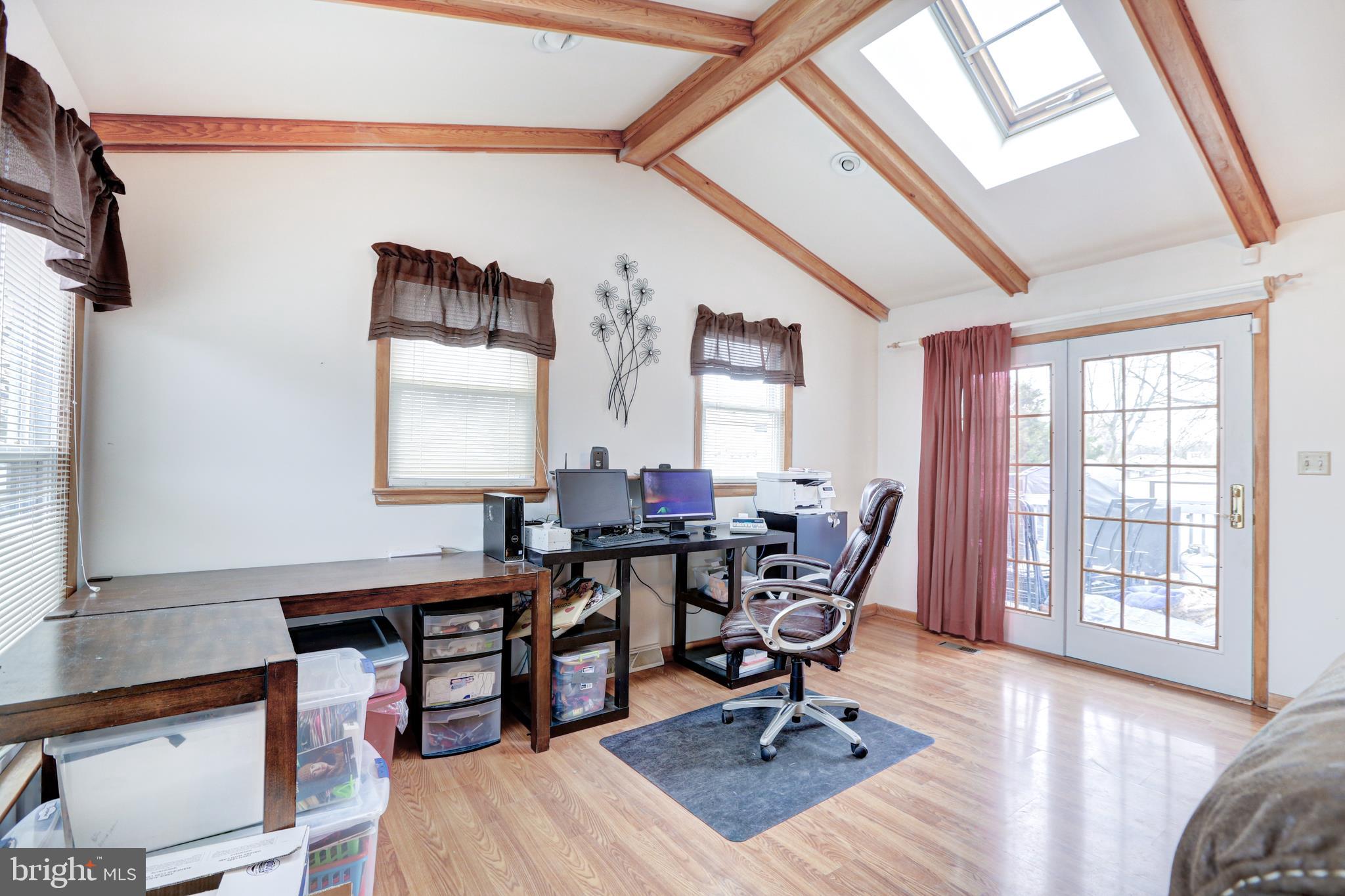 12 Jefferson Road Pennsville, NJ 08070 - Photo 35 of 63 a view of a workspace with furniture and a window