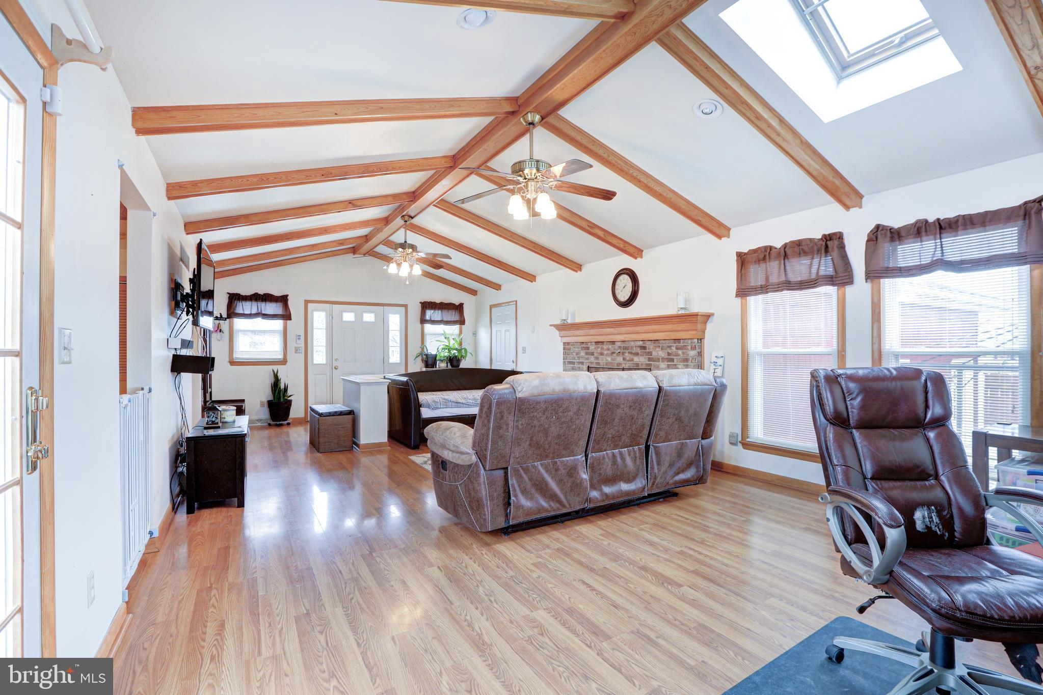 12 Jefferson Road Pennsville, NJ 08070 - Photo 36 of 63 a bedroom with furniture and wooden floor