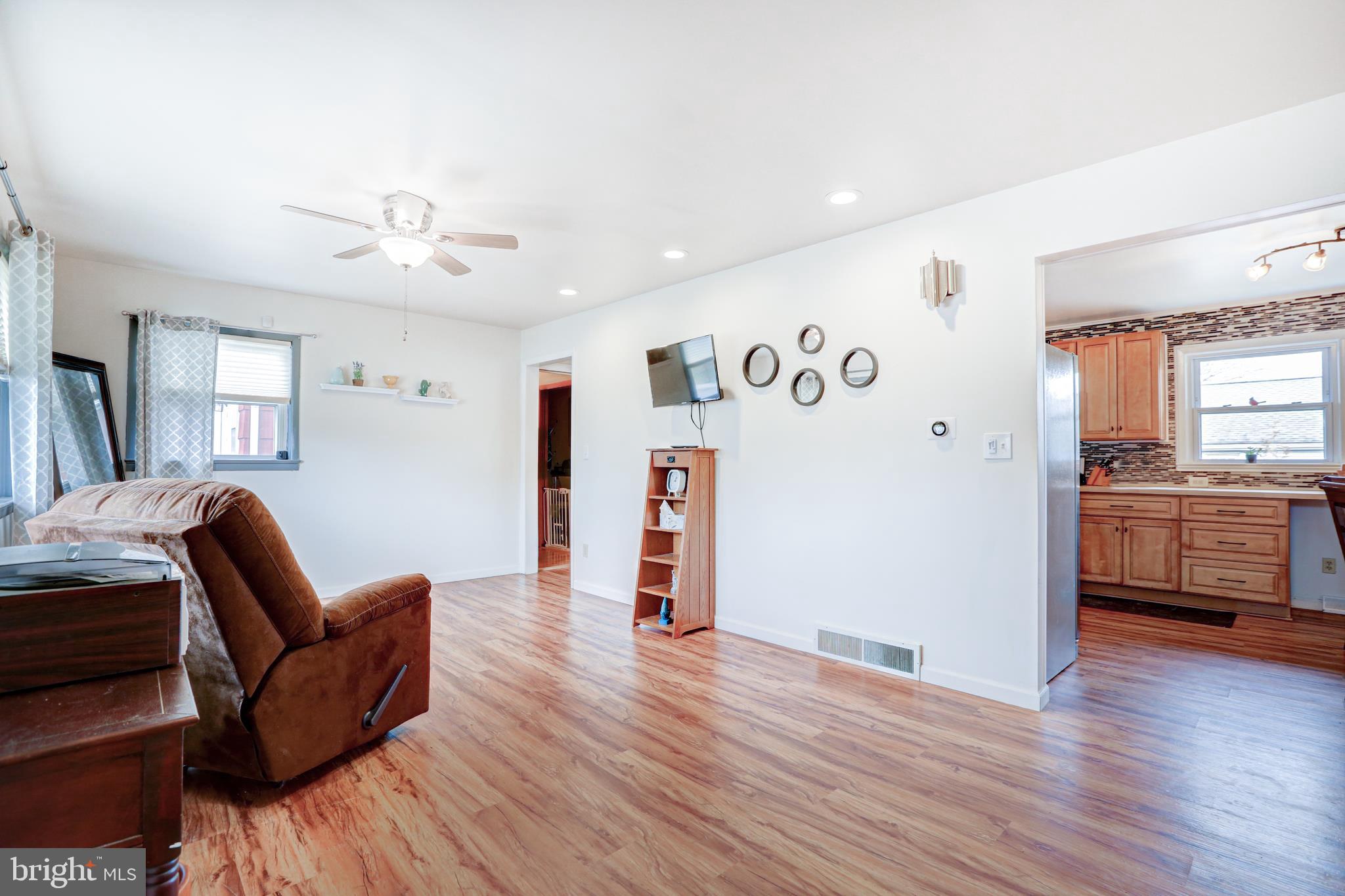 12 Jefferson Road Pennsville, NJ 08070 - Photo 7 of 63 a living room with furniture and wooden floor
