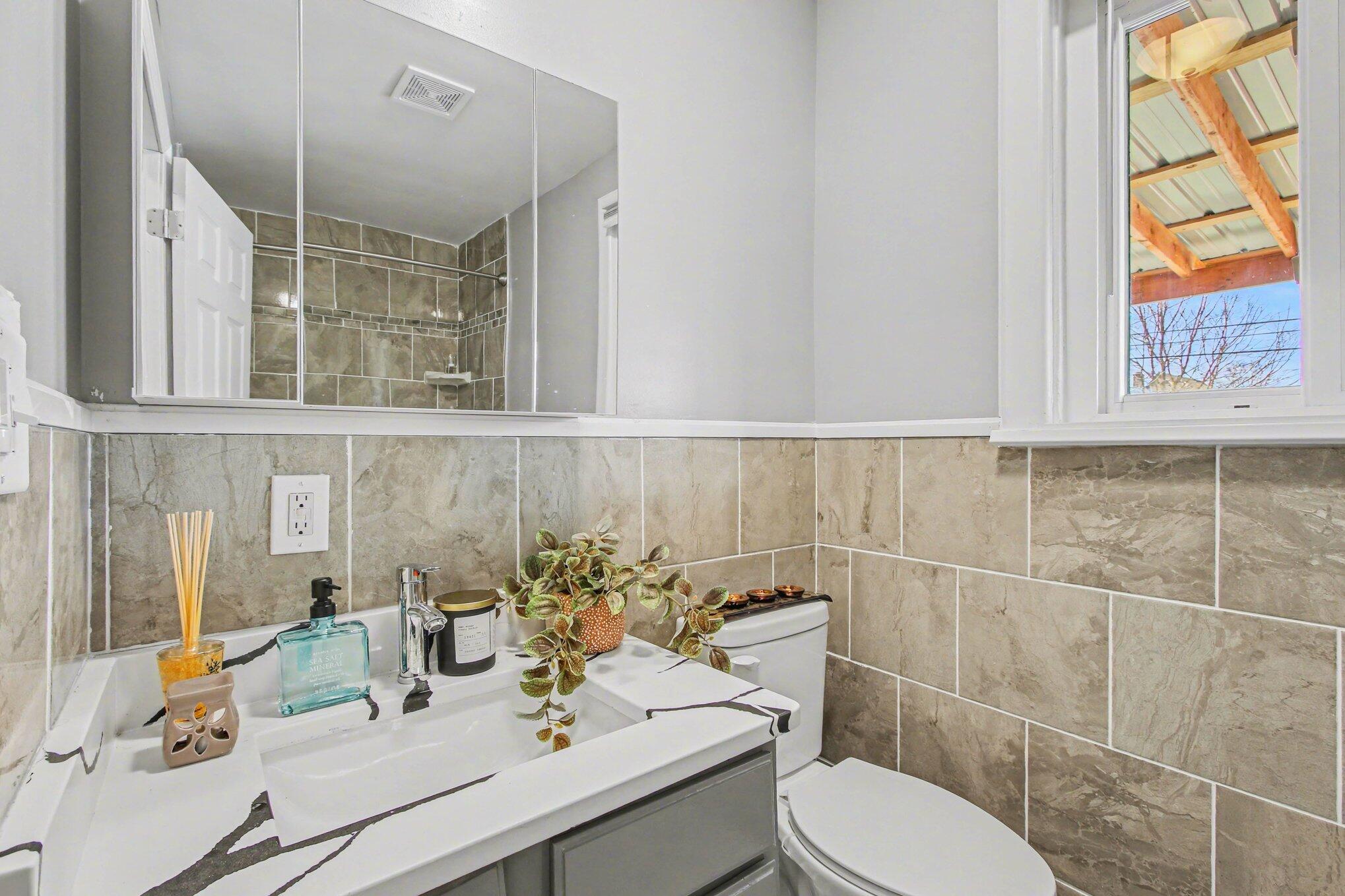 5962 Park Place Hammond, IN 46320 - Photo 11 of 20 a bathroom with a sink and a mirror