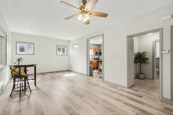a view of a livingroom with furniture and wooden floor